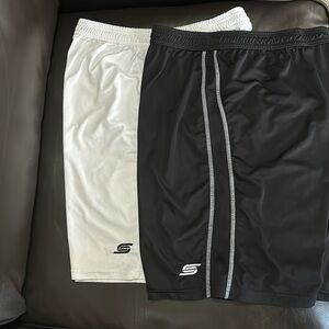 Capelli Sport soccer shorts. Black and white. Both sized large.